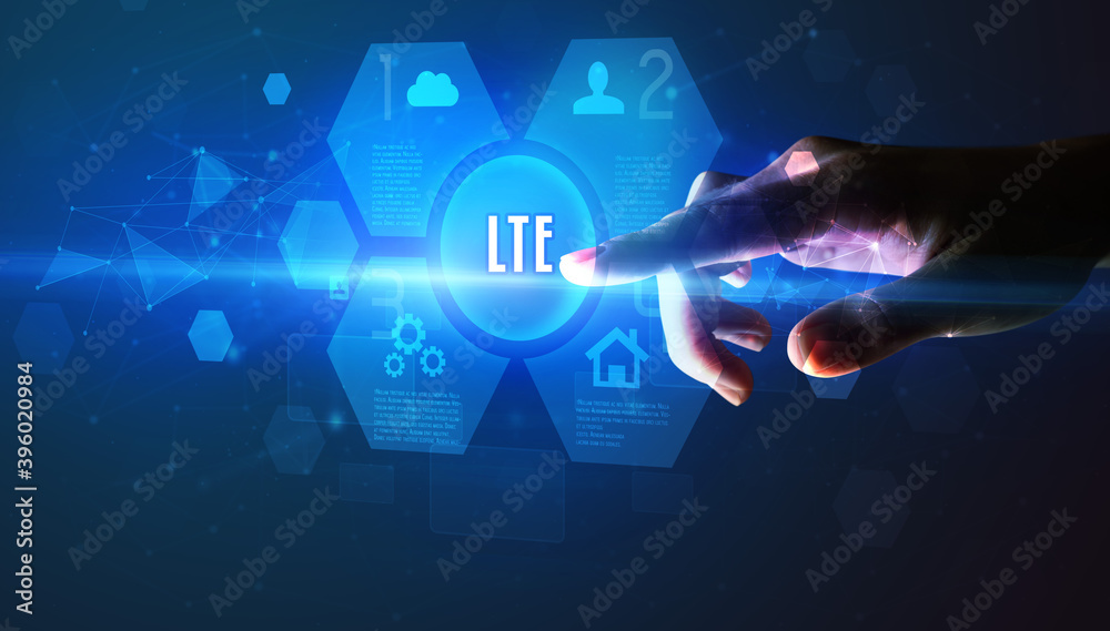 Hand touching LTE inscription, new technology concept Hand touching LTE inscription, new technology concept