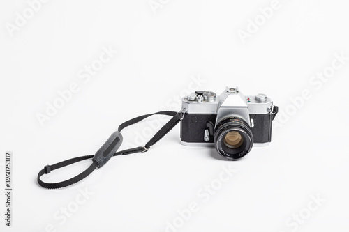 Analogue Camera isolated on white background with neck strap