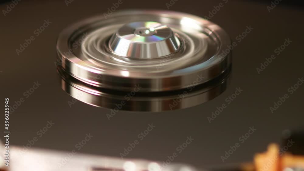 Close up macro of working process of opened Hard disk hdd drive Close up macro of working process of opened Hard disk hdd drive