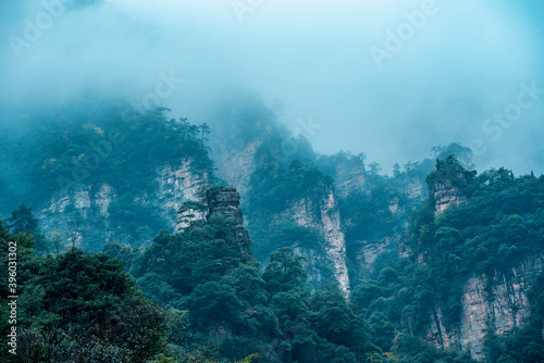 Amazing landscape of mountain and forest in the foggy at Wulingyuan, Hunan, China. Wulingyuan Scenic and Historic Interest Area which was designated a UNESCO World Heritage Site in China