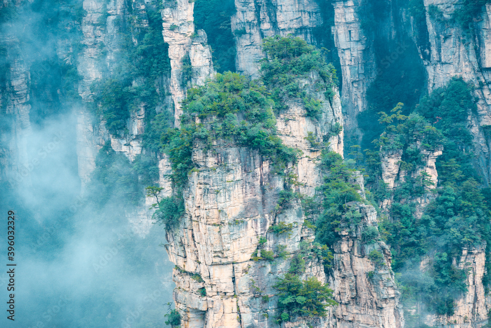 Mountains and forests shimmering in the mist at Wulingyuan , Zhangjiajie national park, Hunan Province, China