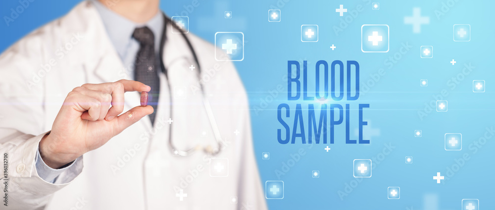 Close-up of a doctor giving a pill with BLOOD SAMPLE inscription, medical concept Close-up of a doctor giving a pill with BLOOD SAMPLE inscription, medical concept