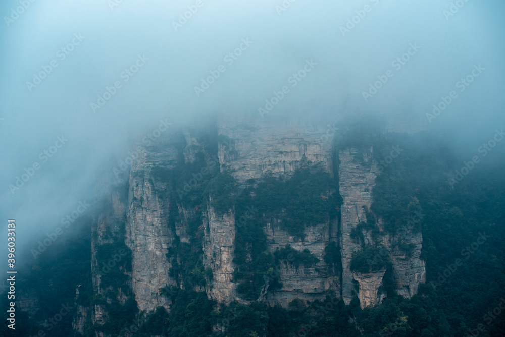 Mountains and forests shimmering in the mist at Wulingyuan , Zhangjiajie national park, Hunan Province, China