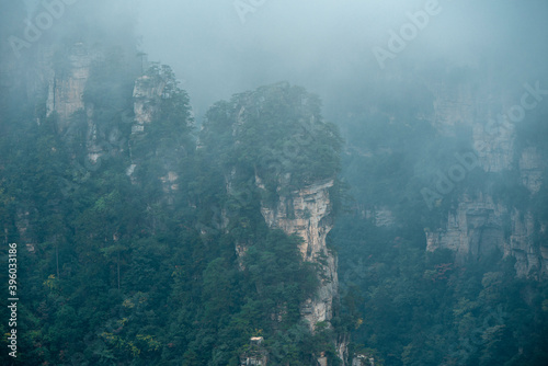 the mountain and forest in foggy at at Wulingyuan. Wulingyuan Scenic and Historic Interest Area which was designated a UNESCO World Heritage Site as well as an AAA scenic area in china. © Nhan