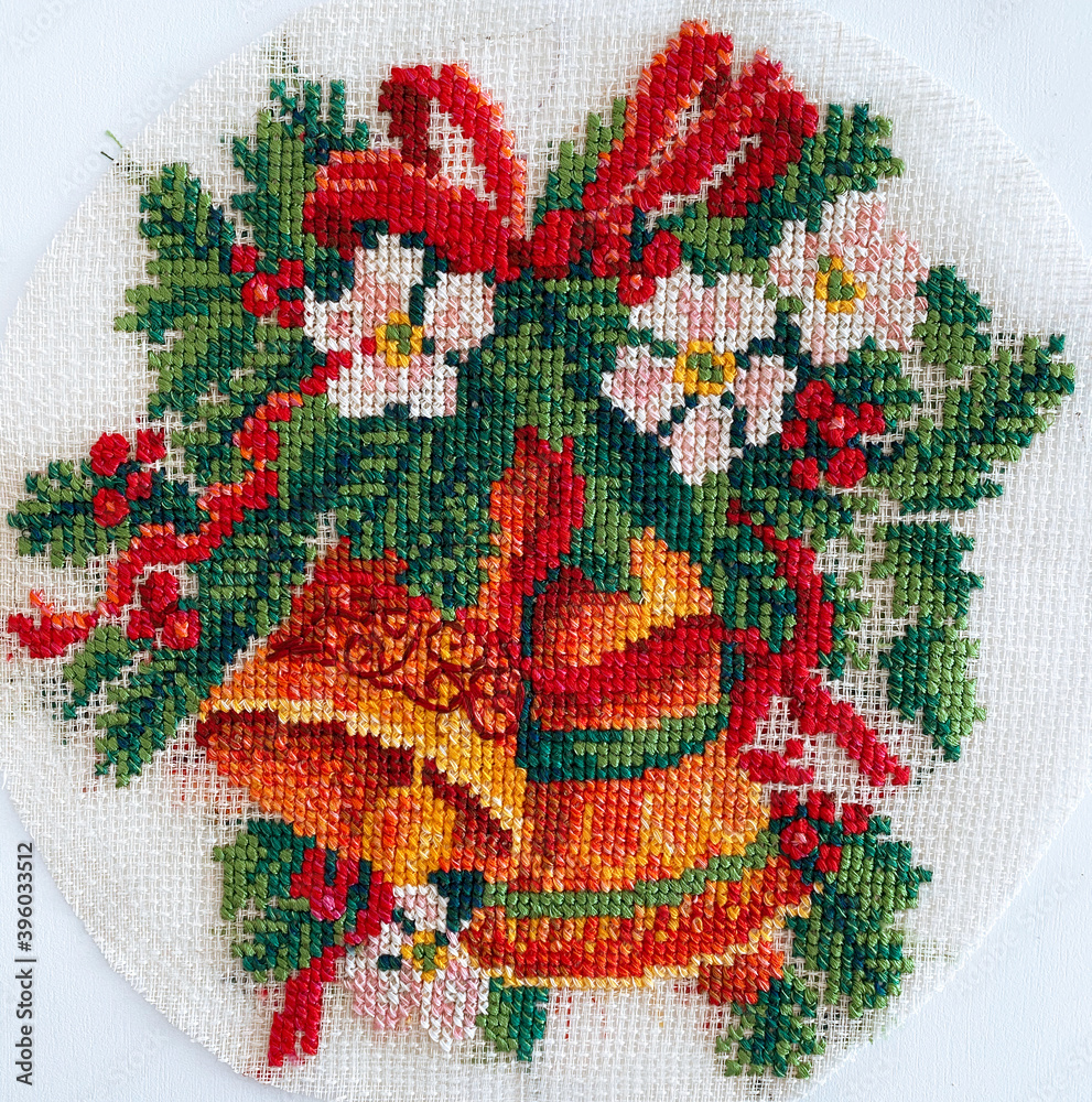 cross stitch christmas wreath with bells and flowers
