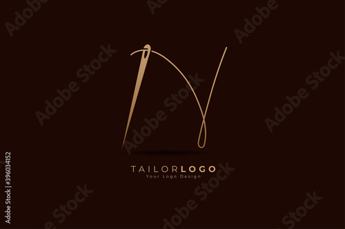 Abstract Initial N Tailor logo, thread and needle combination with gold colour line style , Flat Logo Design Template, vector illustration