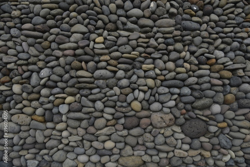walls of a house made of pebbles
