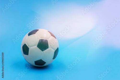 Soccer ball is on blue background
