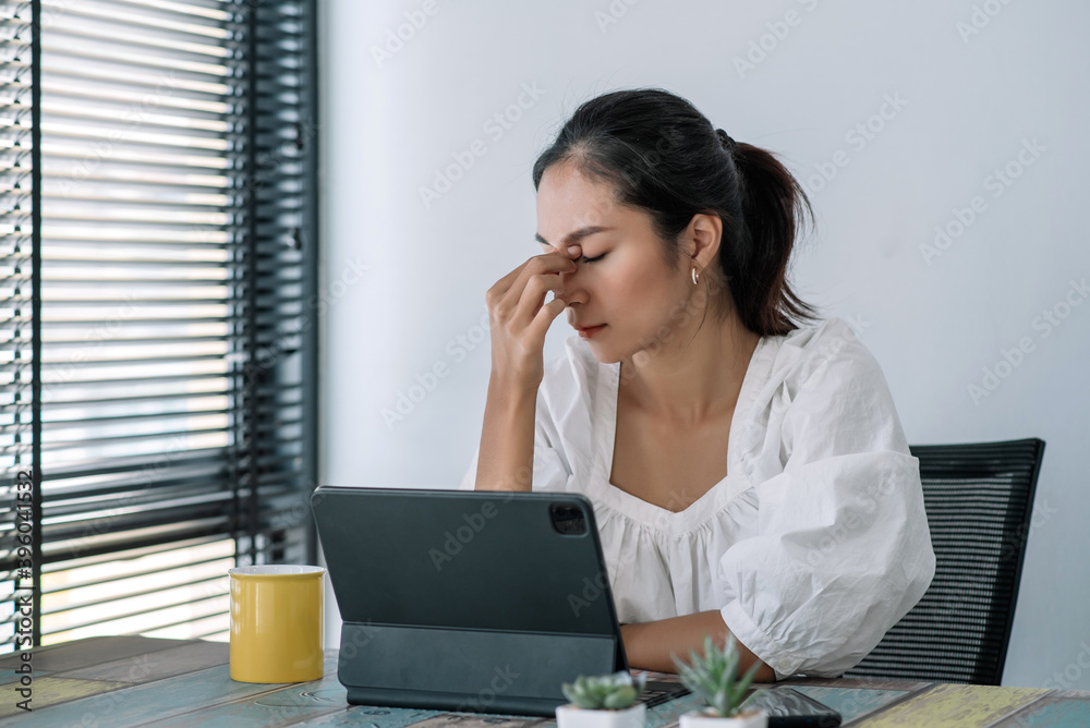 Young asian business woman feeling sick and tired or exhausted from office work. Young asian business woman feeling sick and tired or exhausted from office work.