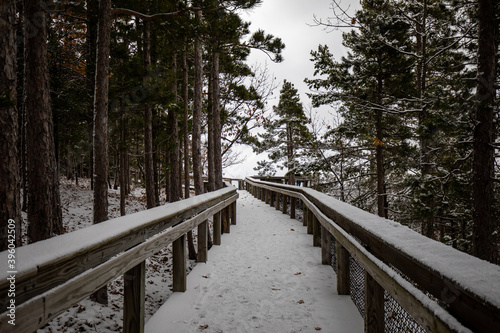 Wood walk way at Porcupine Mountains Wilderness State Park in Michigan. Winter landscape © Daniel
