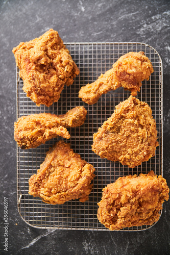 crispy southern style fried chicken in a black stone table