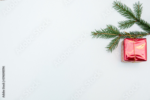 christmas gift with gold and red balls bow isolated on white background