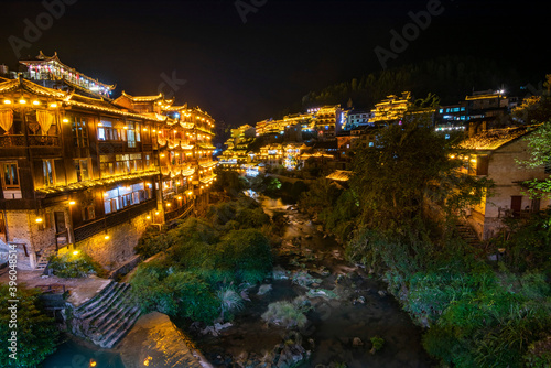  Furong Ancient Town illuminated at night. Amazing beautiful landscape scene of Furong Ancient Town (Furong Zhen, Hibiscus Town), China