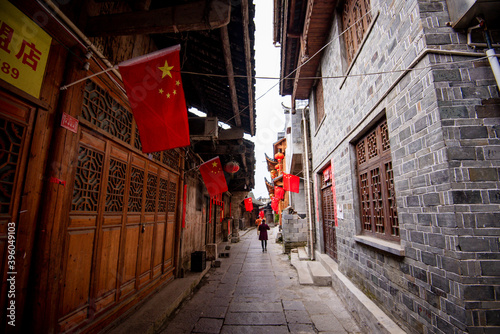  Street view local visitor and tourist in Furong Ancient Town (Furong Zhen, Hibiscus Town), China. Furong Ancient Town is famous tourism attraction place. © Nhan