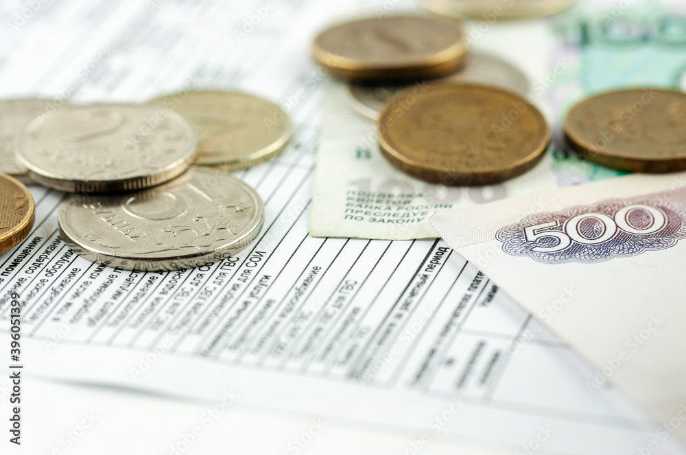 utility bill with coins and bills utility bill with coins and bills