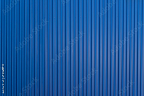 blue corrugate metal sheet background and texture. blue cargo panel wall.