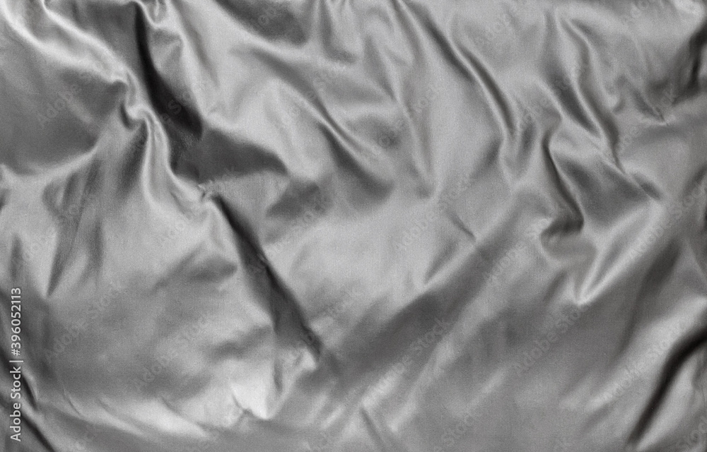 Grey fabric texture. Abstract background. Mockup.Texture of gray silk. Grey fabric texture. Abstract background. Mockup.Texture of gray silk.