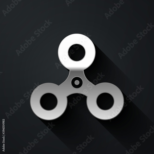 Silver Fidget spinner icon isolated on black background. Stress relieving toy. Trendy hand spinner. Long shadow style. Vector.