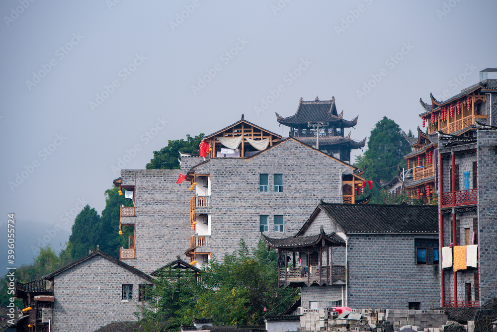 Street view local visitor and tourist in Furong Ancient Town (Furong Zhen, Hibiscus Town), China. Furong Ancient Town is famous tourism attraction place. Street view local visitor and tourist in Furong Ancient Town (Furong Zhen, Hibiscus Town), China. Furong Ancient Town is famous tourism attraction place.