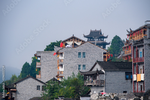  Street view local visitor and tourist in Furong Ancient Town (Furong Zhen, Hibiscus Town), China. Furong Ancient Town is famous tourism attraction place.