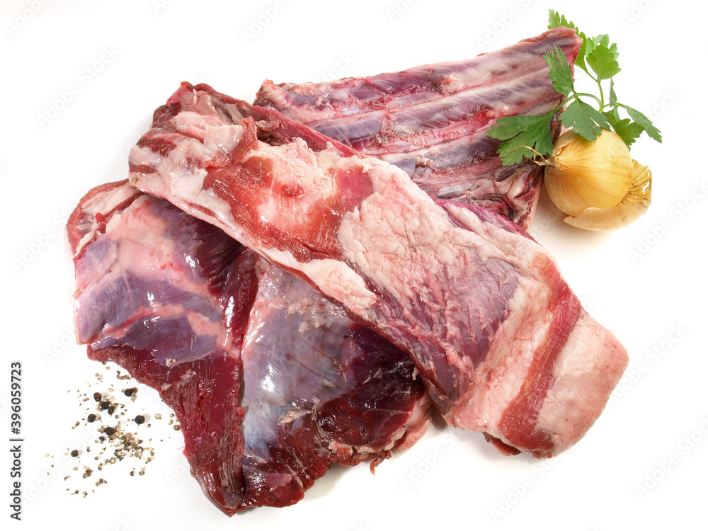 Raw Wild Boar Rips - Pork Meat with Bones isolated on white Background
