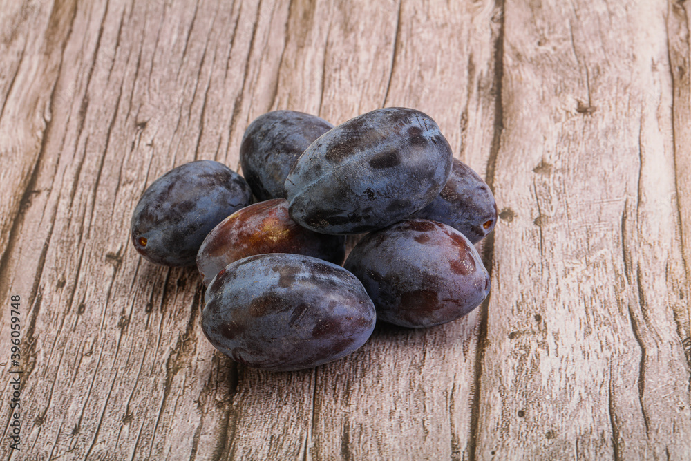 Purple sweet ripe plum heap Purple sweet ripe plum heap