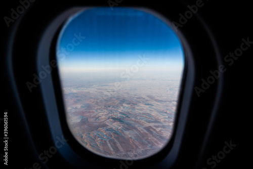 Aerial view of  Inner Mongolia Autonomous Region though an window form an airplane on a sunny day