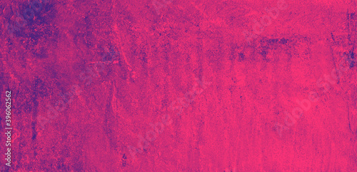 Purple Magenta speckled hand-painted illustration texture design of old distressed vintage grunge concrete with Pink stains. damaged textured abstract washed cement backdrop as web banner background. photo