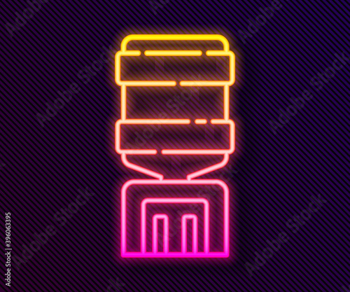 Glowing neon line Water cooler for office and home icon isolated on black background. Water dispenser. Bottle office, plastic and liquid. Vector Illustration.