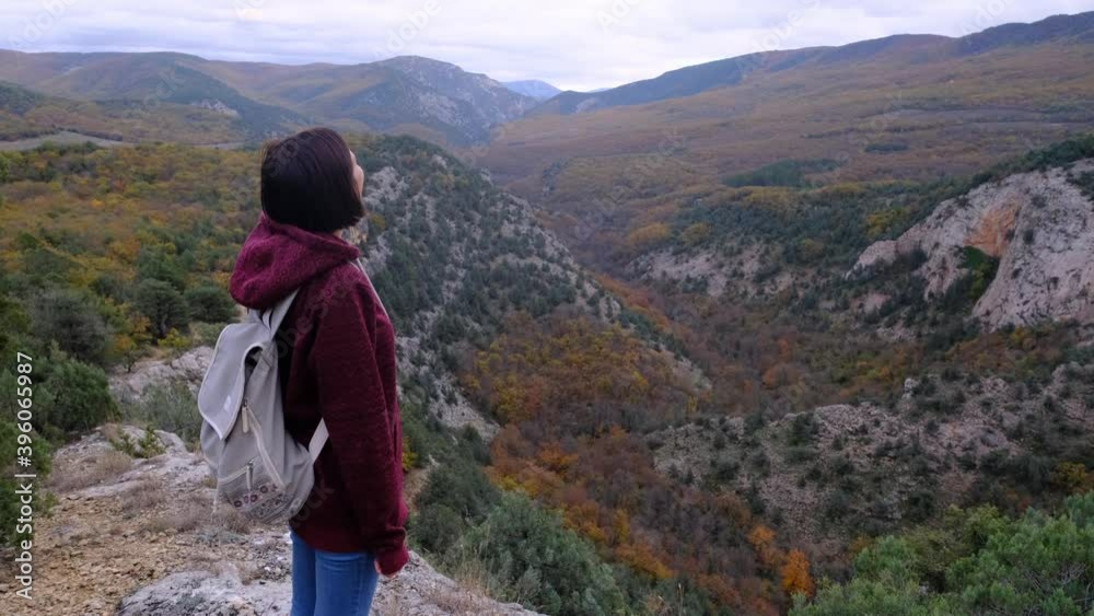 woman on trip or adventure. Young millennial traveller or travel blogger walk in mountain. woman on trip or adventure. Young millennial traveller or travel blogger walk in mountain.