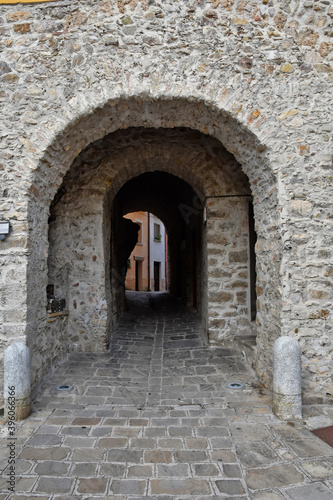 A narrow street among the old houses of Satriano di Lucania  a medieval village in the Basilicata region.