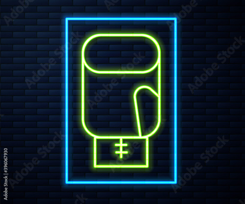 Glowing neon line Boxing glove icon isolated on brick wall background. Vector.