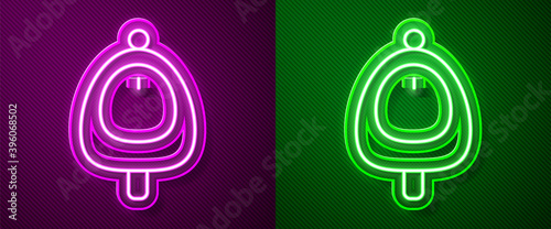 Glowing neon line Toilet urinal or pissoir icon isolated on purple and green background. Urinal in male toilet. Washroom, lavatory, WC. Vector.