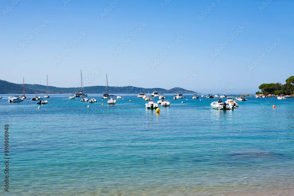 Obraz premium view of boat in the open sea, calm and blue in the Mediterranean between France and Italy for a peaceful, calm and zen vacation