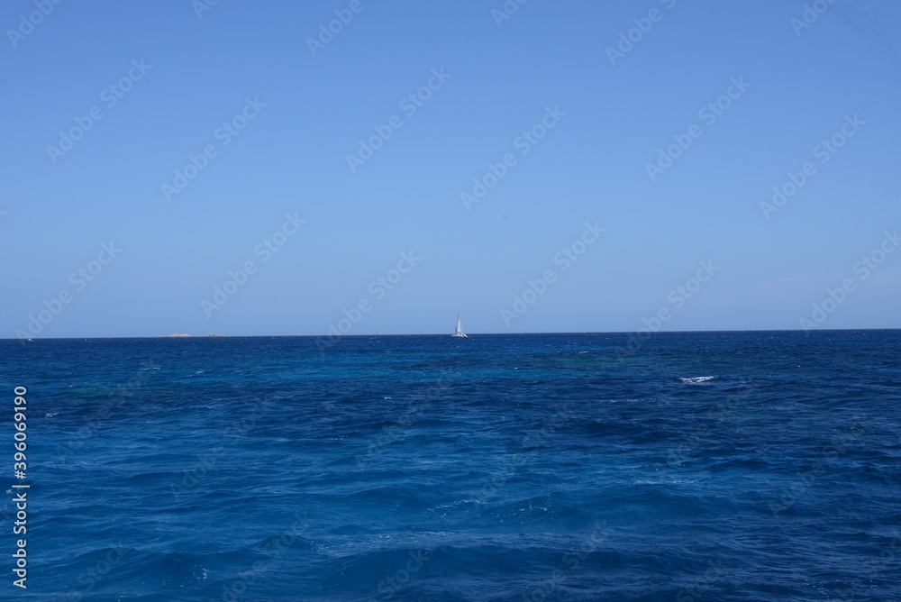 a very beautiful calm blue sea in the mediterranean between france and italy for peaceful, calm and zen vacations