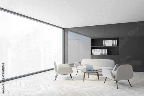 Minimalistic gray panoramic kitchen corner with table and sofa