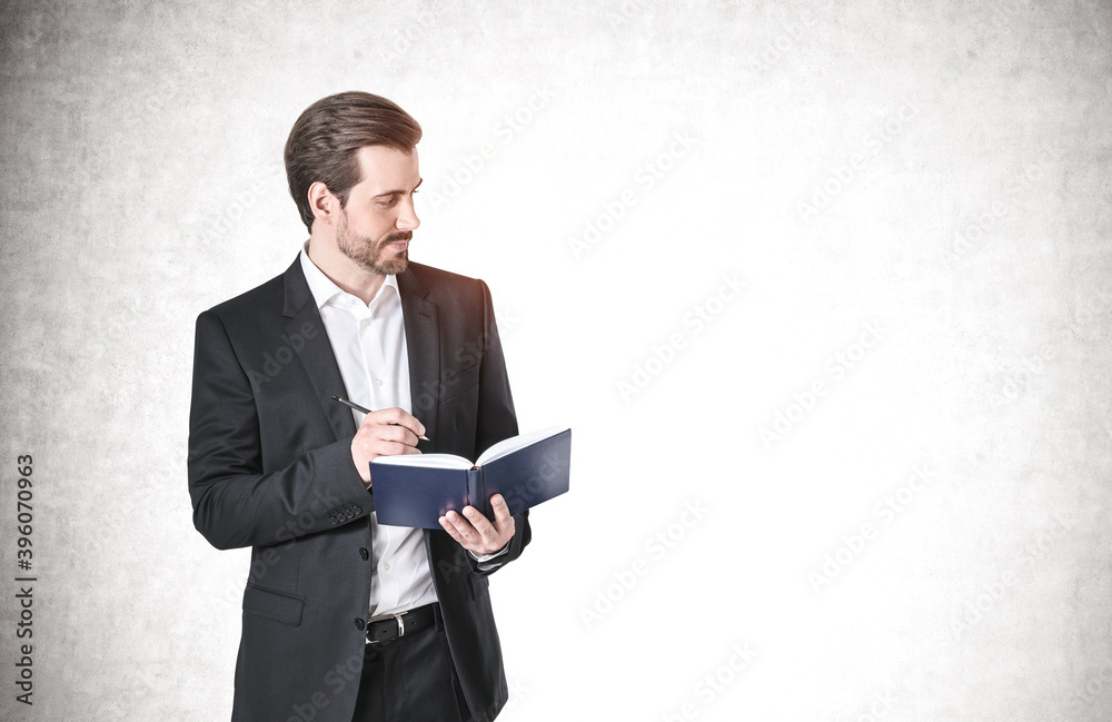 Young businessman with book, mock up Young businessman with book, mock up