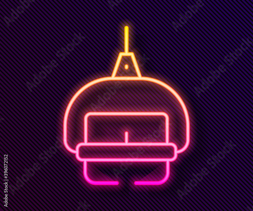 Glowing neon line Ski lift icon isolated on black background. Vector.