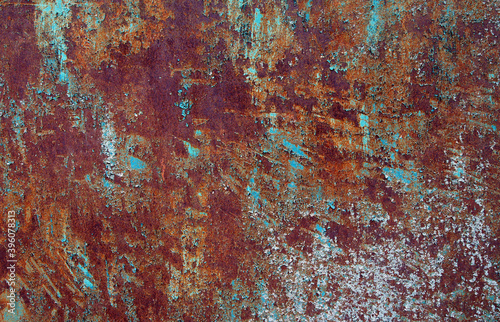 Rusty steel sheet with remnants of paint