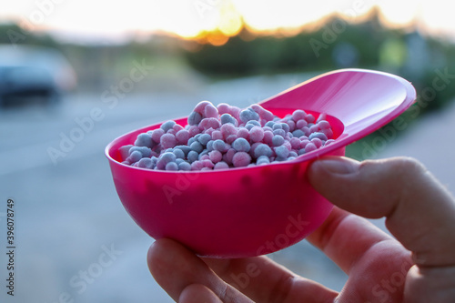 Little balls of ice cream against sunset 