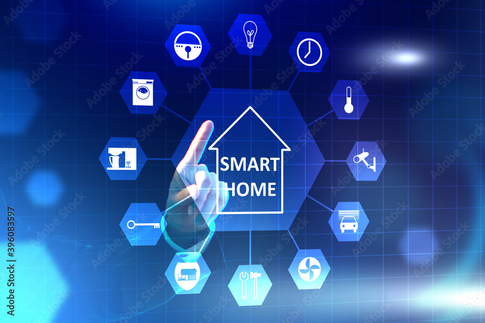 Person controls the smart home. Man's hand next to smart home logo He controls smart home using menu. Electronics control panel on a virtual screen.Panel for control IOT house. Blue background. Person controls the smart home. Man's hand next to smart home logo He controls smart home using menu. Electronics control panel on a virtual screen.Panel for control IOT house. Blue background.
