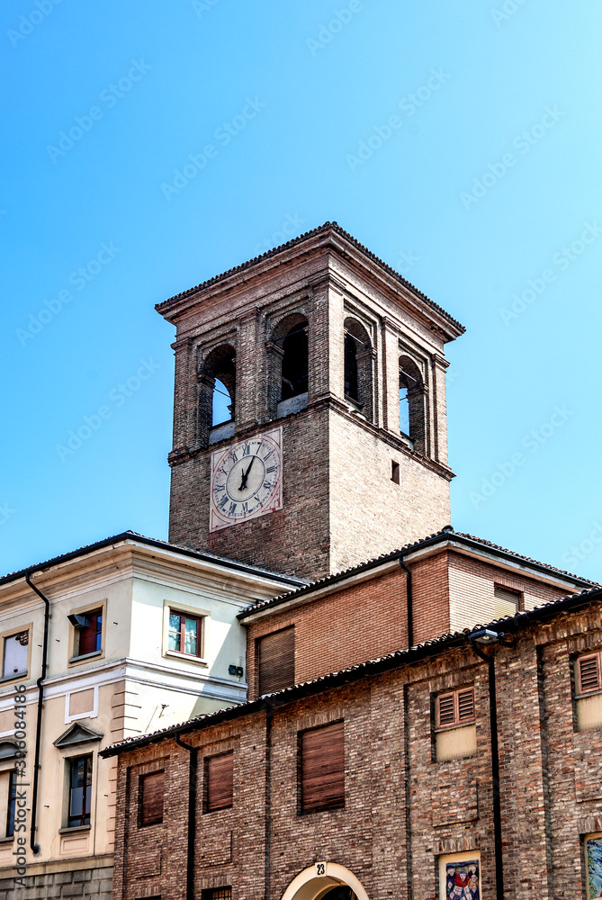 The bell tower with clock of the College of San Francesco, house of the Museum of Natural Science of the Barnabites, beside the Church of Saint Francis, in Lodi, Lombardy, northern Italy.