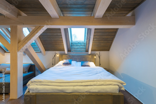 Luxury room in the Interior of the Expensive Hotel.
Interior of a luxury hotel penthouse in mountain resort. Alpes, Europe.
Nice warm interior of mountain lodge apartment. Holidays in mountains. photo