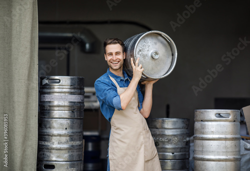 Εκτύπωση καμβά Modern brewery and worker with keg on plant, small business and beer industry