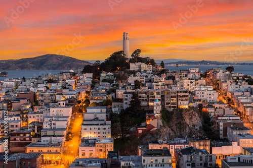 View of Coit tower with sunset sky in downtown San Francisco, California.