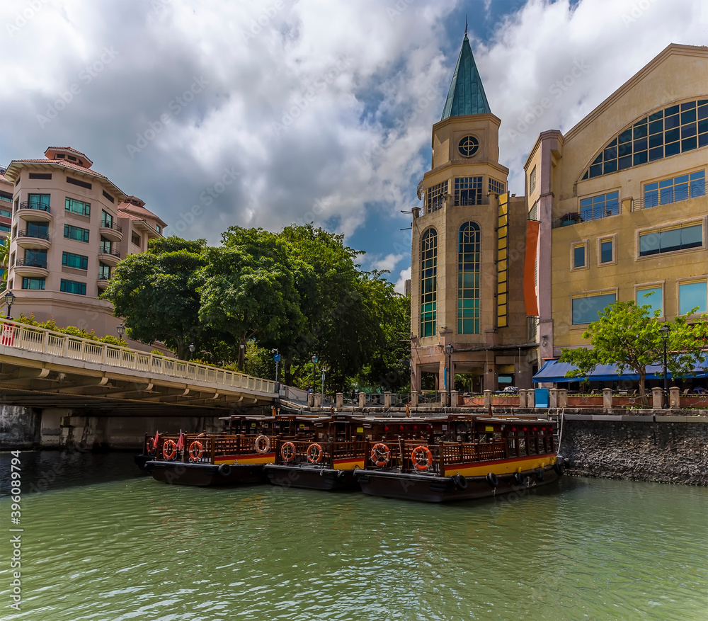 A view of river boats moored on the Singapore river at Clarke Quay in Singapore, Asia