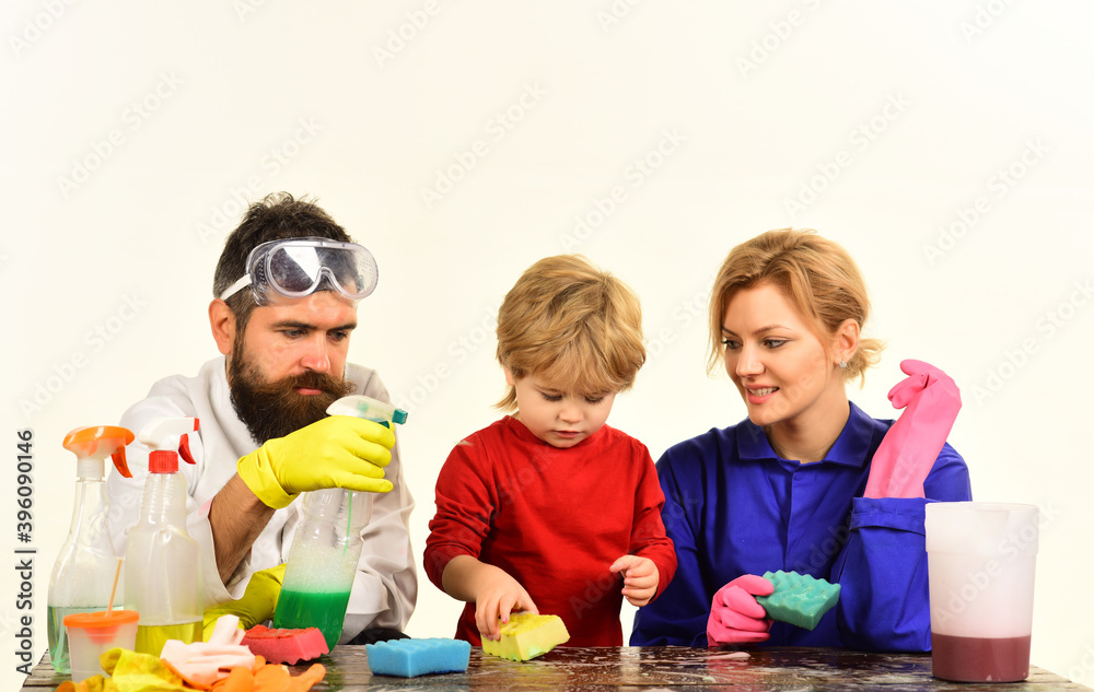 Home cleaning. Cleaning day. Family clean together. Playing with cleaning tools. Cleaning spray. Desinfection. Soap. Rubber gloves.