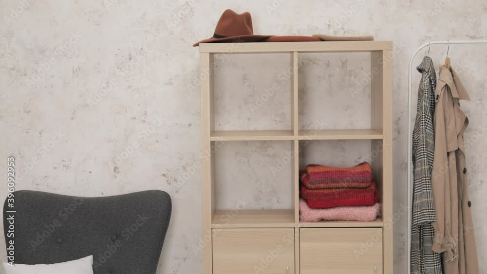 Stop motion video with winter clothes in dressing room