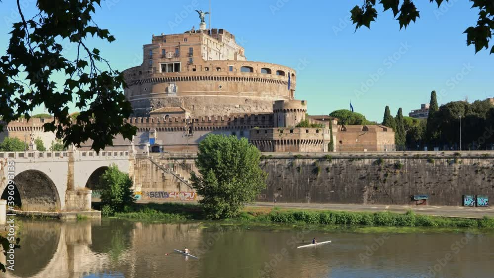 Castel Sant Angelo (Mausoleum of Hadrian) and kayaks on Tiber river in city of Rome, Italy Castel Sant Angelo (Mausoleum of Hadrian) and kayaks on Tiber river in city of Rome, Italy