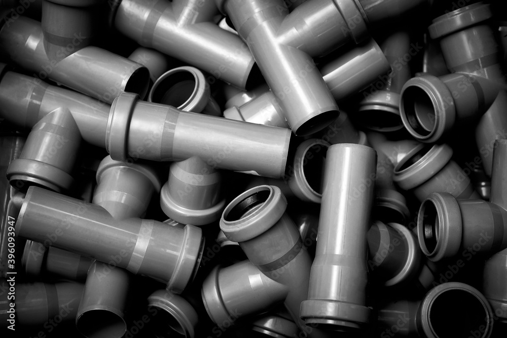 Fototapeta premium Plastic sewer fittings. The disposal of waste water. Can be used for background